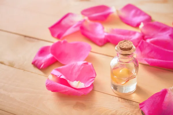 Bottle Rose Essential Oil Table — Stock Photo, Image