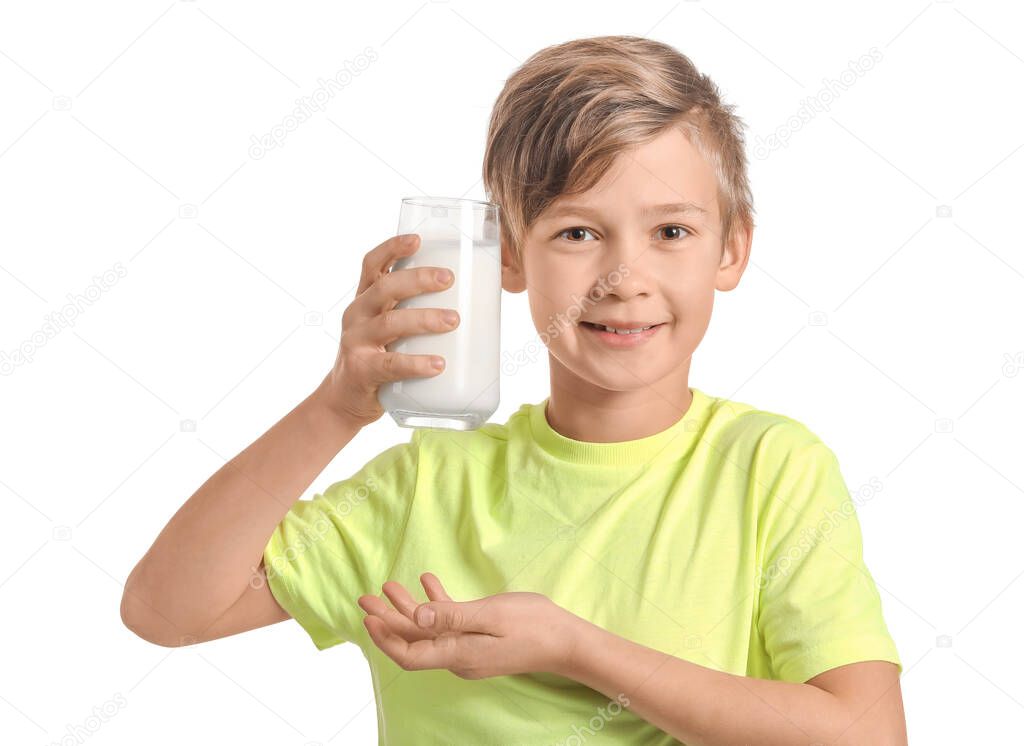 Little boy with milk on white background