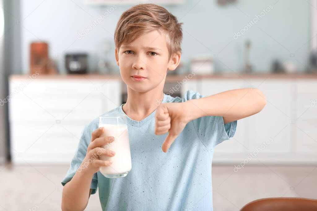 Little boy with dairy allergy in kitchen