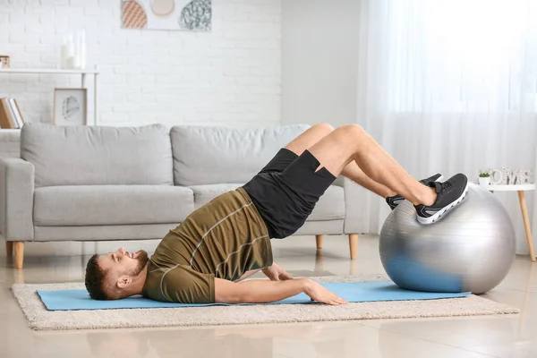 Sporty Young Man Training Home — Stock Photo, Image