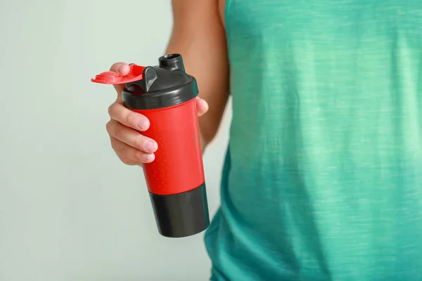 Sporty Man Protein Shake Light Background Closeup — Stock Photo, Image