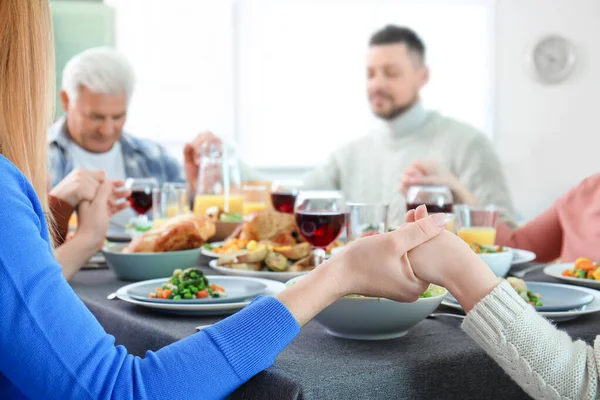 Family celebrating Thanksgiving Day at home