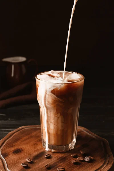 Pouring Milk Cold Coffee Glass Table — Stock Photo, Image