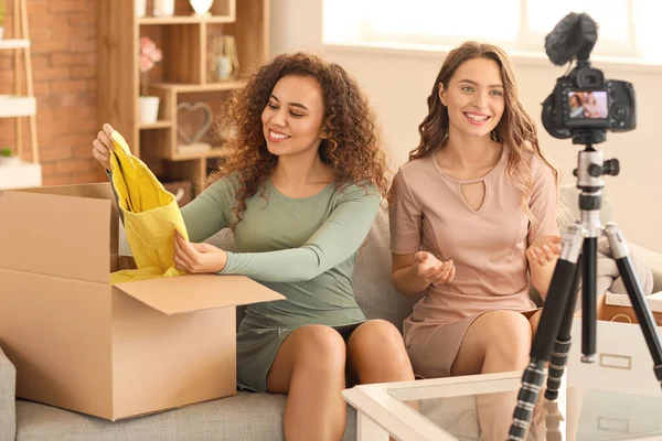 Young Female Bloggers Recording Video While Unpacking Parcel Home — Stock Photo, Image