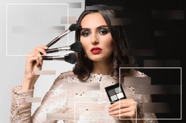 Siyah beyaz arka planda makyaj fırçası ve kozmetik ürünleri olan güzel genç bir kadın.