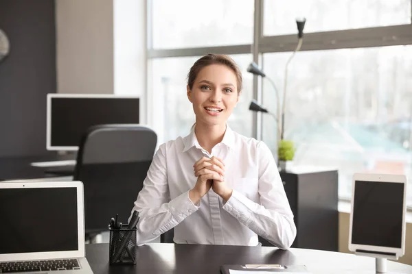 Young woman during job interview in office