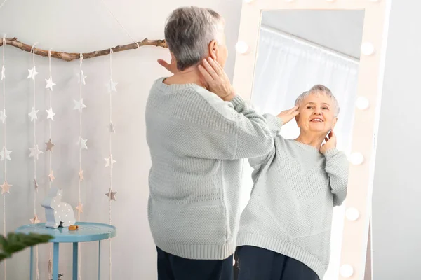 Happy Senior Woman Looking Her Reflection Mirror — Stock Photo, Image
