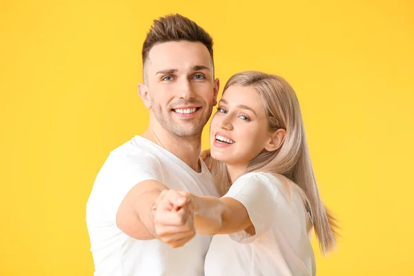 Happy Dancing Young Couple Color Background — 스톡 사진