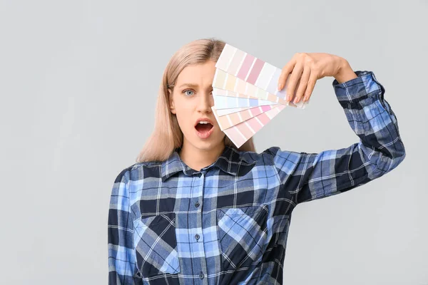Shocked Woman Color Swatches Grey Background — Stock Photo, Image
