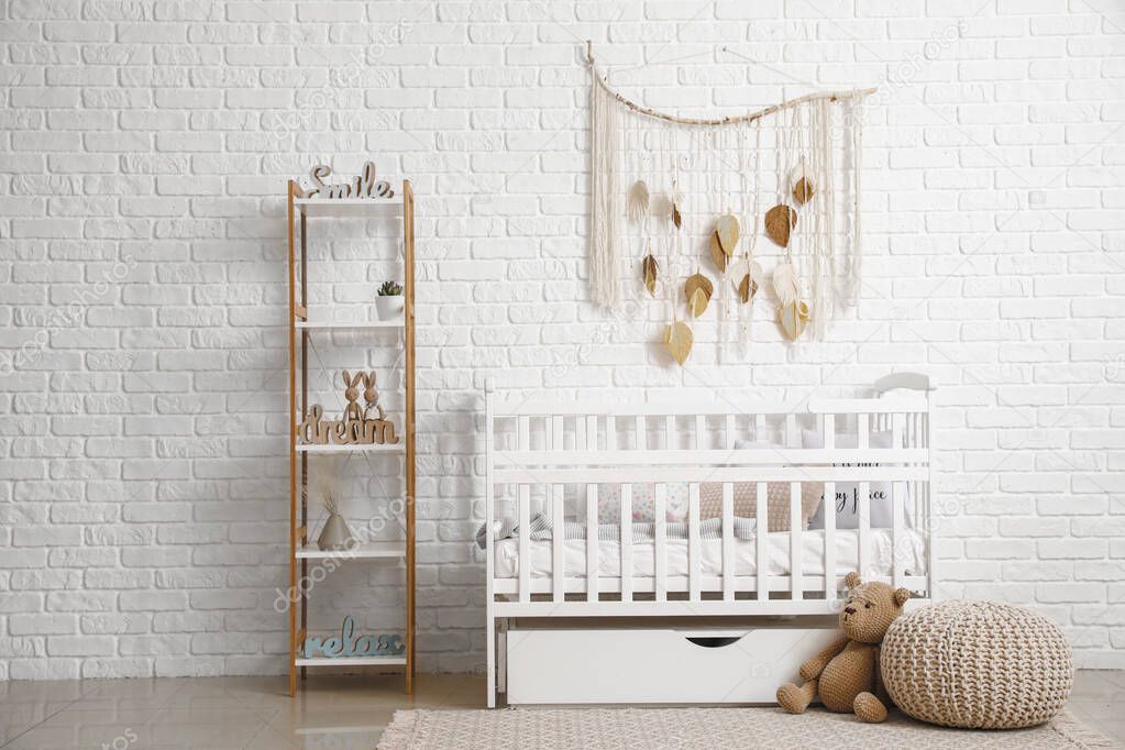 Baby bed with rack in interior of children's room