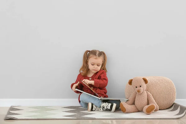 Cute Little Girl Reading Book Grey Wall — Stock Photo, Image