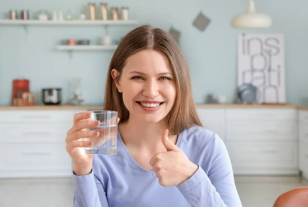 Beautiful Young Woman Glass Water Showing Thumb Home — Stock Photo, Image