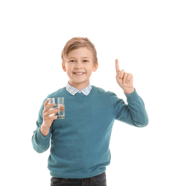 Menino Bonito Com Vidro Água Dedo Indicador Levantado Fundo Branco — Fotografia de Stock