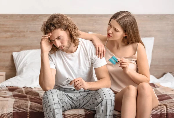 Sad Young Couple Oral Erectile Dysfunction Medication Condom Bedroom — Stock Photo, Image