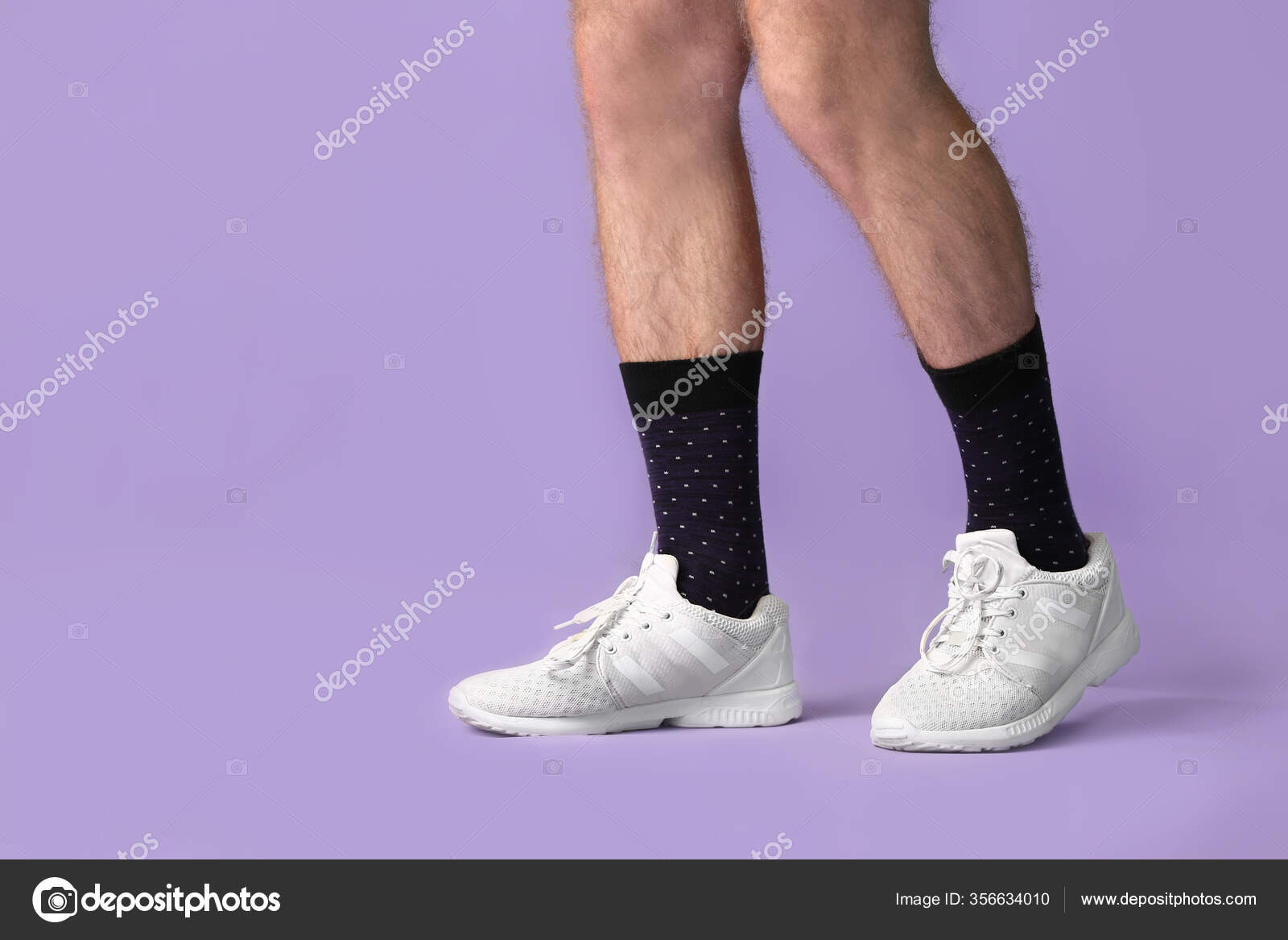 Male Feet In Long Socks And Sneakers Run Along Forest Path Stock Photo,  Picture and Royalty Free Image. Image 196478842.