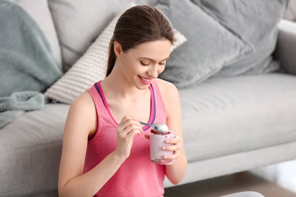 Young Woman Eating Tasty Yogurt Home — Stock Photo, Image