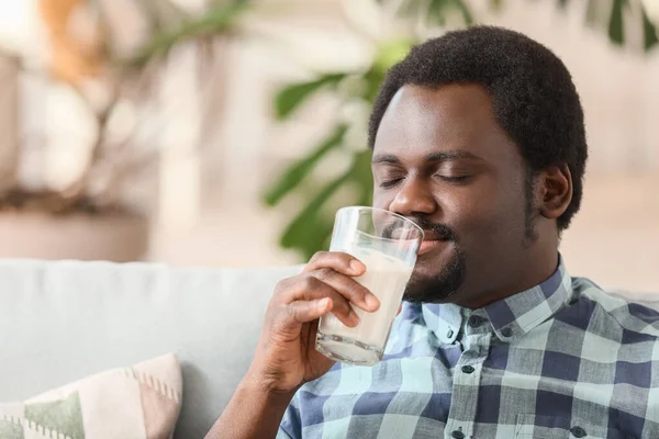Young African American Man Drinking Milk Home — Stock Photo, Image