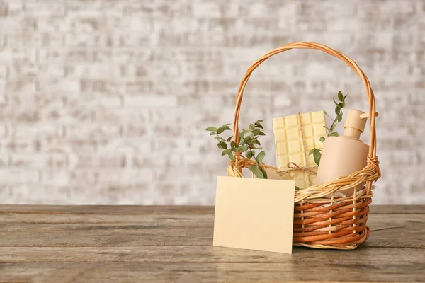 Basket with gifts for Mother\'s Day on table