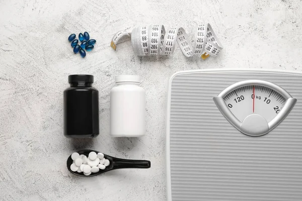 Weight Loss Pills Scales Measuring Tape Light Background — Stock Photo, Image