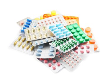 Beyaz arka planda farklı haplar