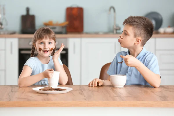 Cute Little Children Eating Melted Chocolate Kitchen — 스톡 사진