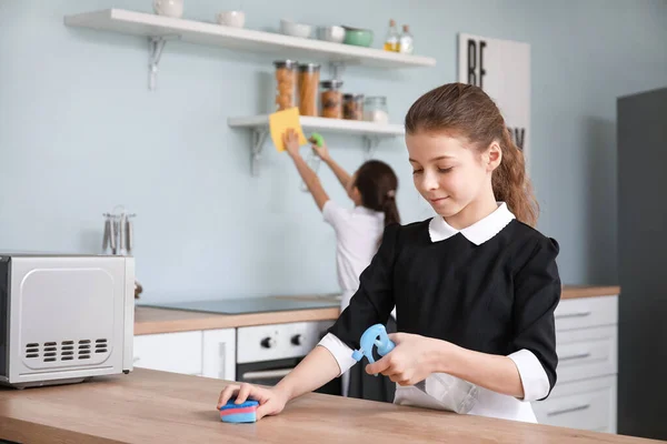 Cute Little Chambermaids Cleaning Kitchen — Stock Photo, Image