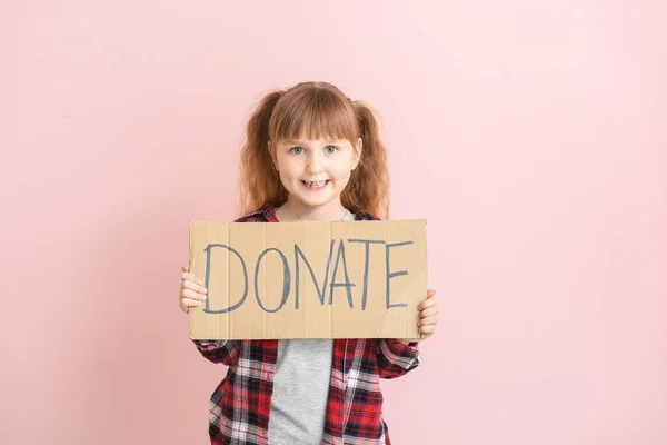 Bambina Possesso Cartone Con Testo Donate Sfondo Colori — Foto Stock