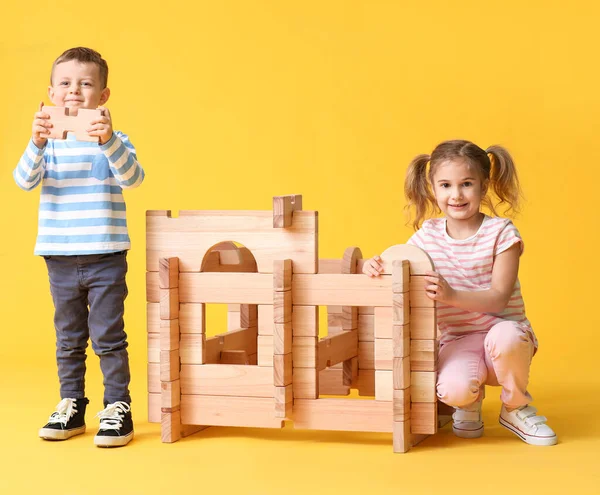 Little Children Playing Take Apart House Color Background — Stock Photo, Image