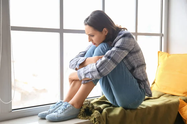 Mujer Joven Deprimida Cerca Ventana —  Fotos de Stock