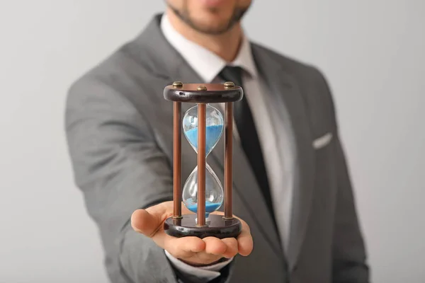 Businessman Hourglass Light Background Time Management Concept — Stock Photo, Image