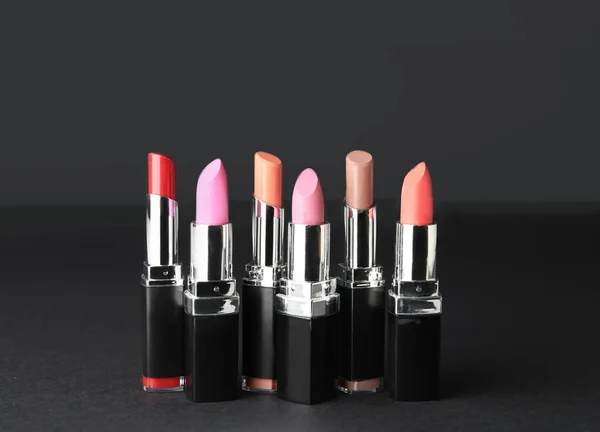 Different Lipsticks Dark Background — Stock Photo, Image