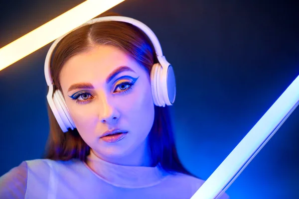 Toned Portrait Beautiful Woman Neon Lamps Headphones Dark Background — Stock Photo, Image