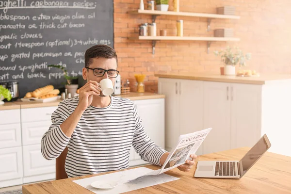 Young Man Cup Hot Coffee Newspaper Kitchen — Stock Photo, Image