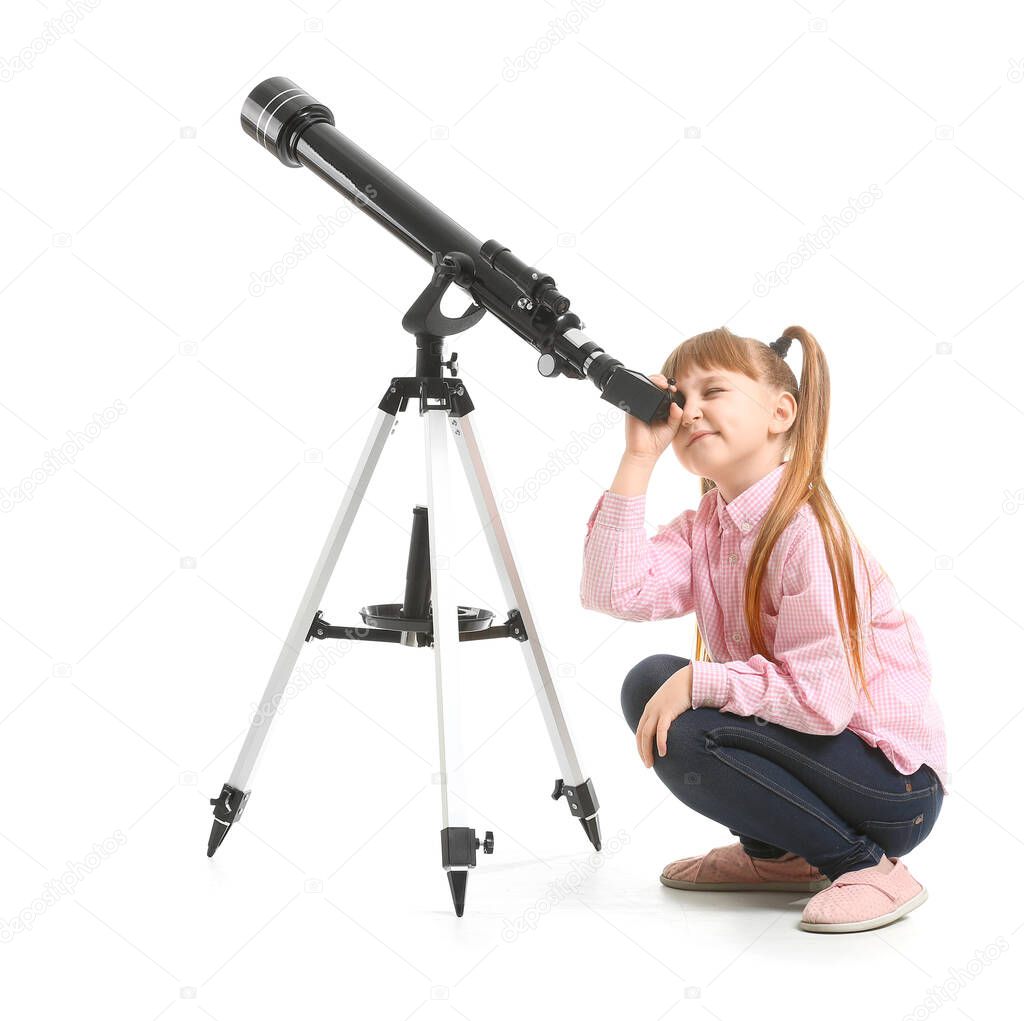 Cute little girl with telescope on white background