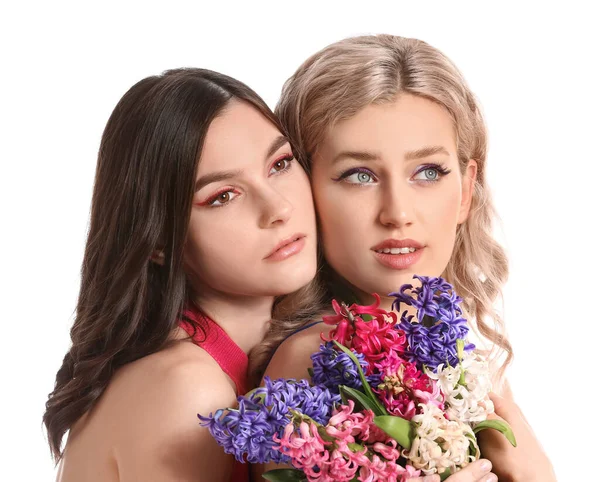 Hermosas Mujeres Jóvenes Con Flores Jacinto Sobre Fondo Blanco — Foto de Stock