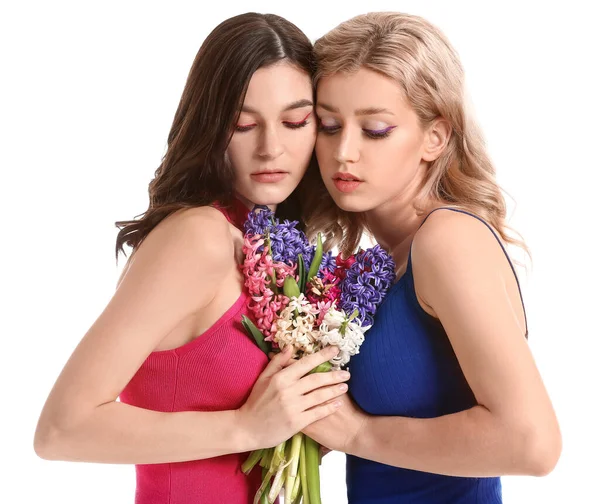 Vackra Unga Kvinnor Med Hyacint Blommor Vit Bakgrund — Stockfoto