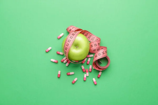 Вимірювальна Стрічка Яблуко Таблетки Схуднення Кольоровому Фоні — стокове фото