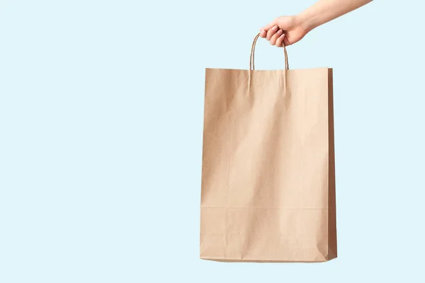 Female Hand Paper Shopping Bag Color Background — Stock Photo, Image