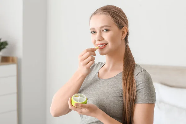 Young Woman Taking Pill Home — Stock Photo, Image
