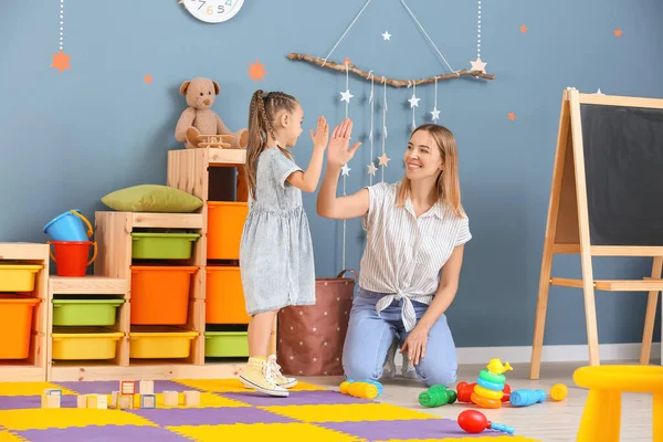 Nanny Cute Little Girl Playing Home — Stock Photo, Image