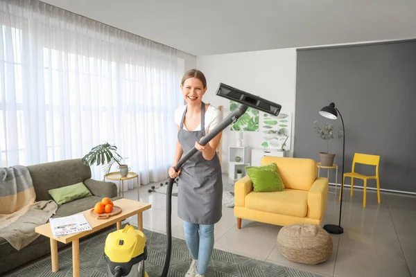 Young Woman Hoovering Floor Home — Stock Photo, Image