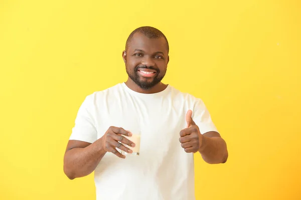 African American Man Milk Showing Thumb Color Background — Stock Photo, Image