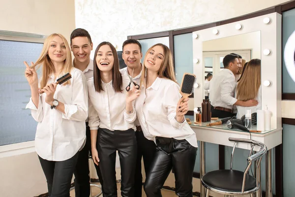 Young people during professional courses in hairdresser\'s salon