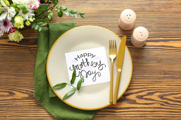 Table setting with card for Mother\'s day dinner