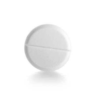 Beyaz arka planda bir hap