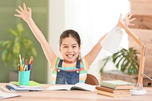 Happy Asian Girl Her Homework Done Sitting Table — Stock Photo, Image