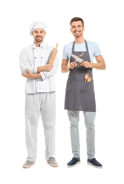 Männlicher Koch Mit Teilnehmern Von Kochkursen Auf Weißem Hintergrund — Stockfoto