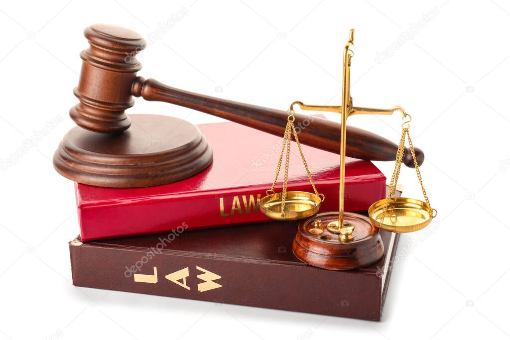 Judge's gavel, books and scales of justice on white background