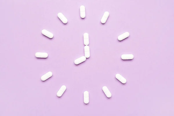 Clock Made Sleeping Pills Color Background — Stock Photo, Image