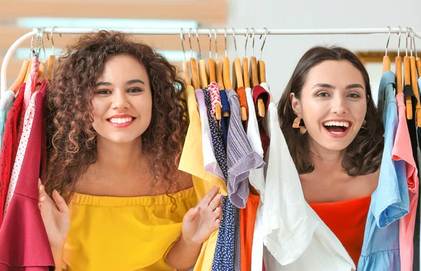 Young Women Choosing Clothes Modern Store — Stok fotoğraf